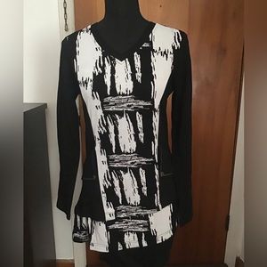 Exquisite tunic top by Dzhavael Couture